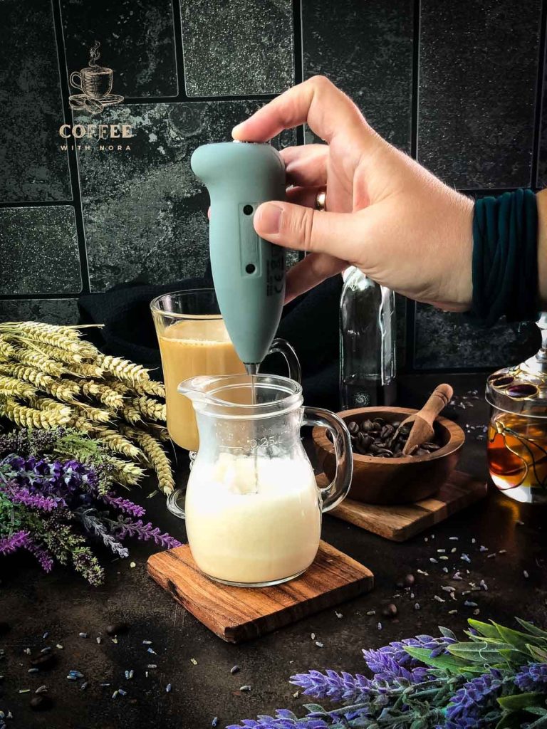 Froth the remaining oat milk with your frother.