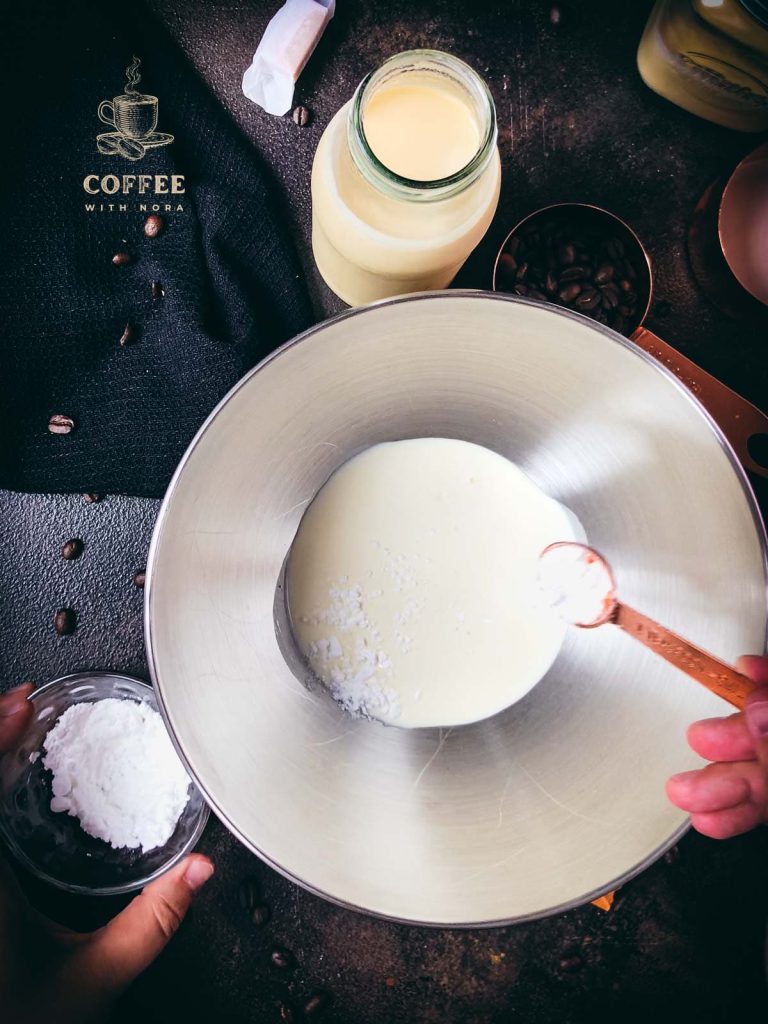 Combine powdered sugar, heavy cream, and coffee creamer.