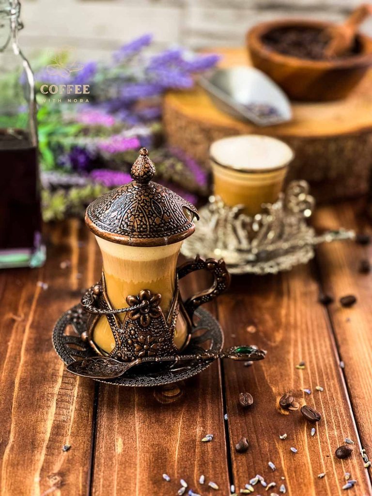 Soothing lavender latte in gorgeous medieval cup.