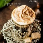 Beautiful pumpkin flavored whipped cream piped on black coffee.