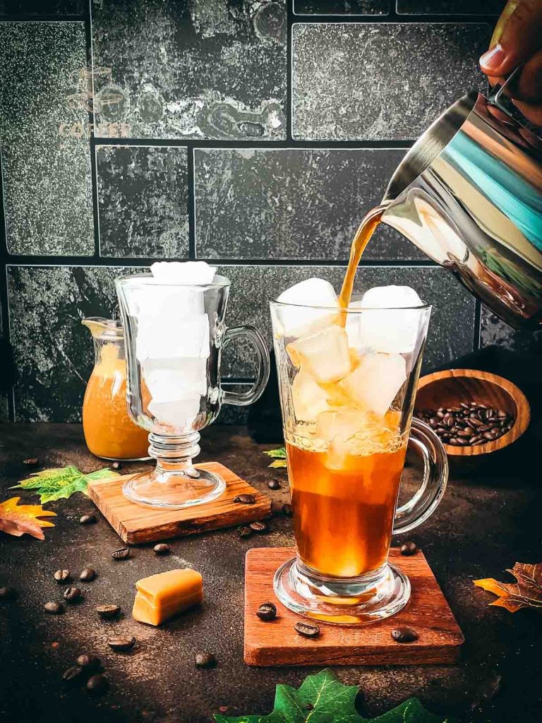 Tall, narrow coffee glass, gets filled with strong coffee.