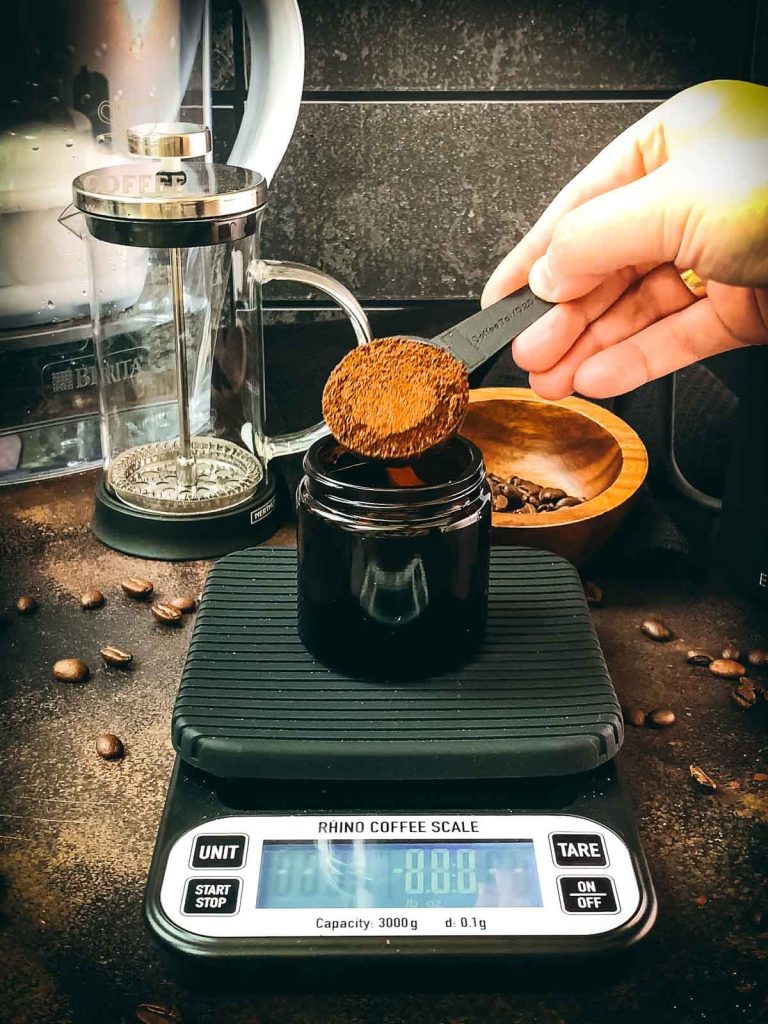 Weigh the coffee on a barista scale.