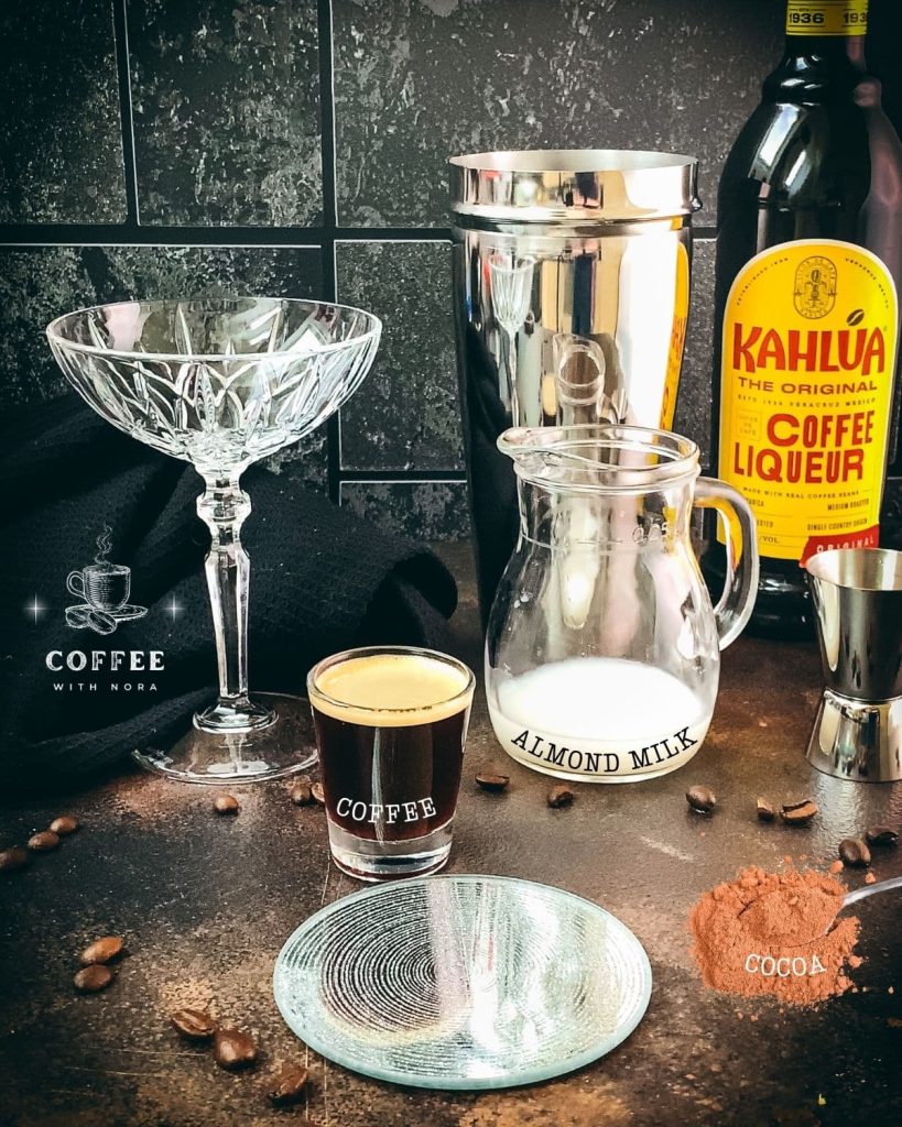 Only a few ingredients are required for making this delicious iced chocolate almondmilk shaken espresso - Kahlua, coffee, almond milk, and cocoa powder.