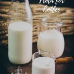 A bottle, a jug and a small container filled with different types of milk. Placed on a dark ground.