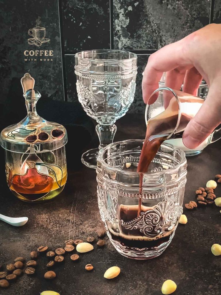 Pour two double espresso into your serving glasses.