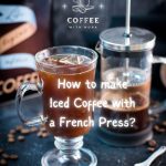 Cute glass filled with French press iced coffee placed next to French press.