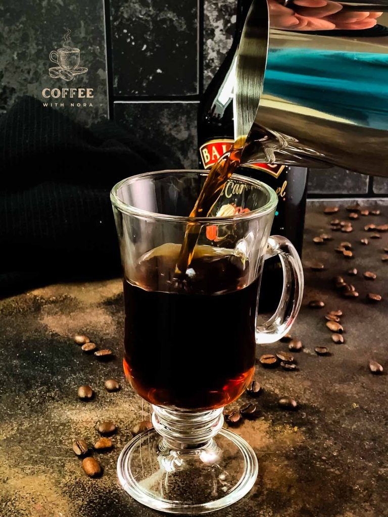 Add strong coffee to your serving glass.