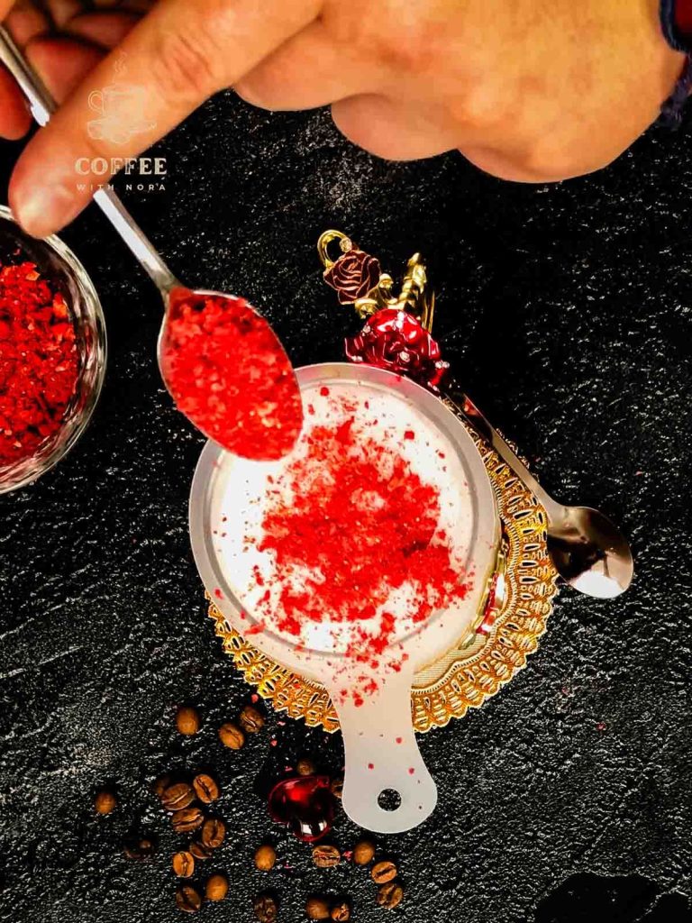 Dust the freeze-dried strawberries on top of your stencil covered coffee.