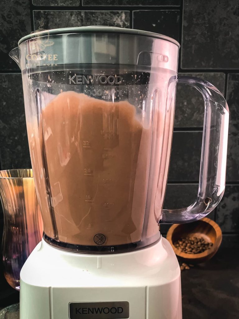 Blend cold brew, chocolate ice cream and ice cold water with the blender until creamy.