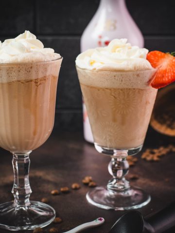 Delicious strawberry iced coffee in beautiful serving glasses.