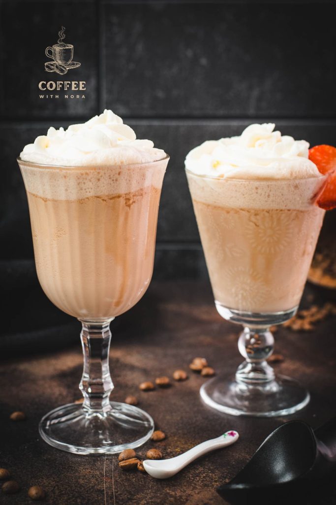 Delicious strawberry iced coffee in beautiful serving glasses.