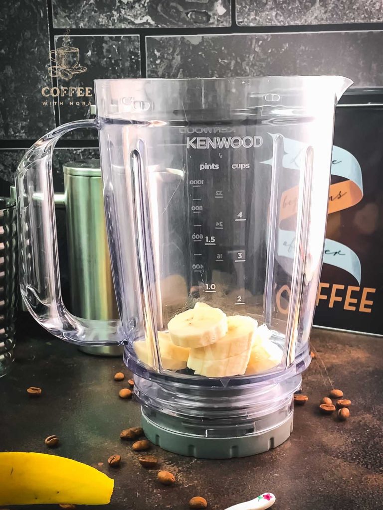 Add the banana slices to the blenders chug.