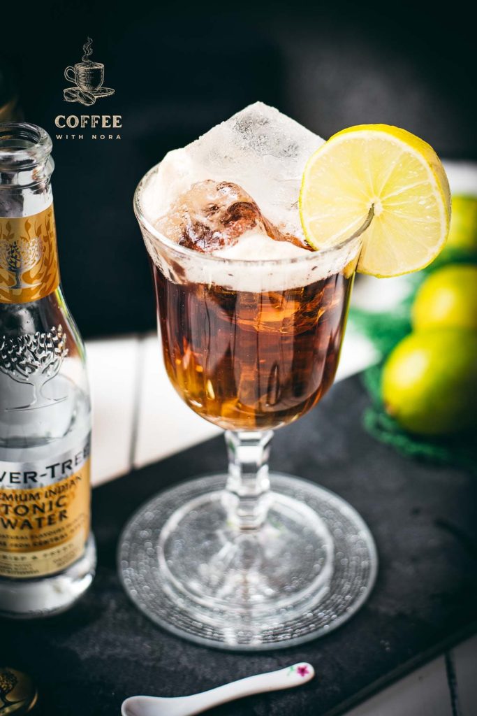 Gorgeous cold brew tonic, served in a wine glass.