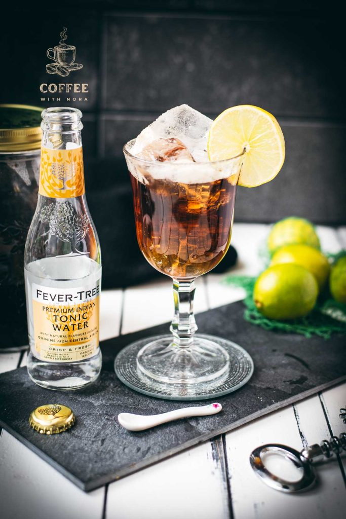 Gorgeous cold brew tonic, served in a wine glass.