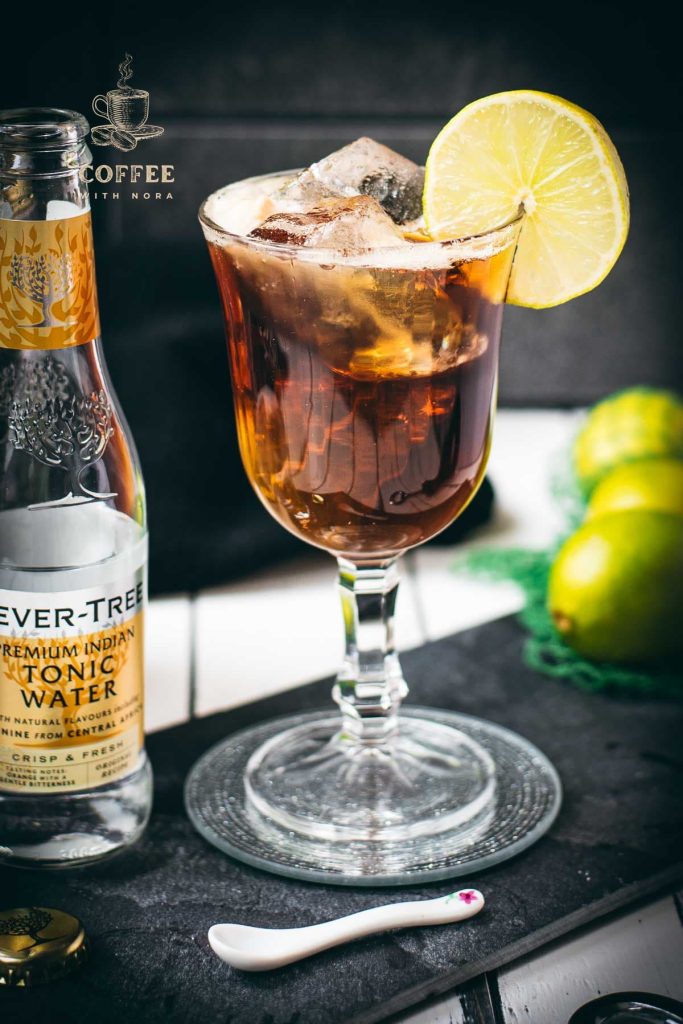 Gorgeous cold brew tonic, served in a wine glass.