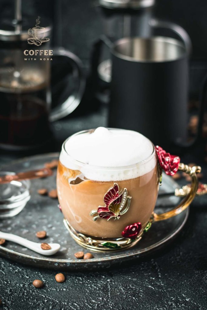 Gorgeous butterfly glass filled with delicious French press vanilla iced coffee. A feast for the eyes and the palate!