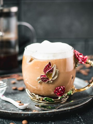 Gorgeous butterfly glass filled with delicious French press vanilla iced coffee. A feast for the eyes and the palate!