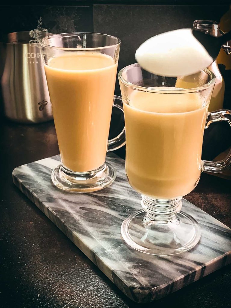 Top your ginger coffee with frothed milk and dust with cinnamon.