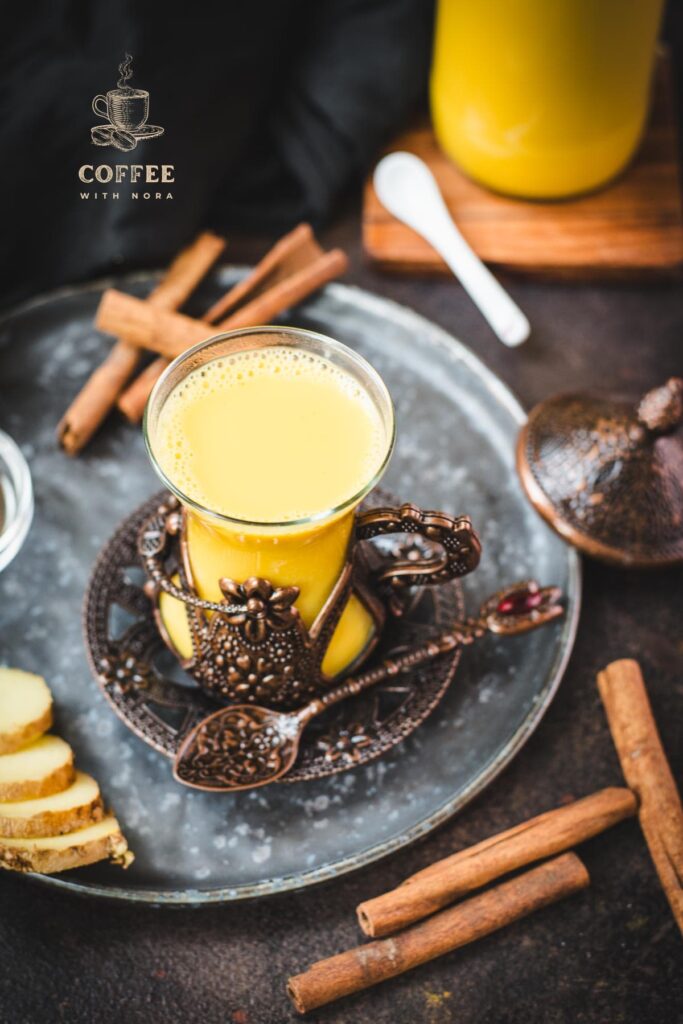 Gorgeous medieval coffee cup filled with delicious spiced almond milk.