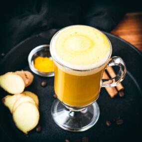 Gorgeous golden turmeric milk coffee. Made with homemade turmeric milk.