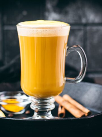 Gorgeous golden turmeric milk coffee. Made with homemade turmeric milk.