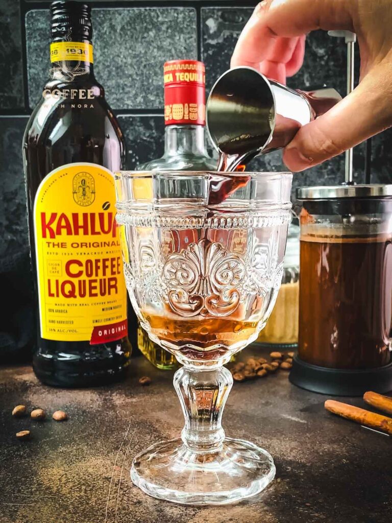 Add Kahlua to the serving glass.