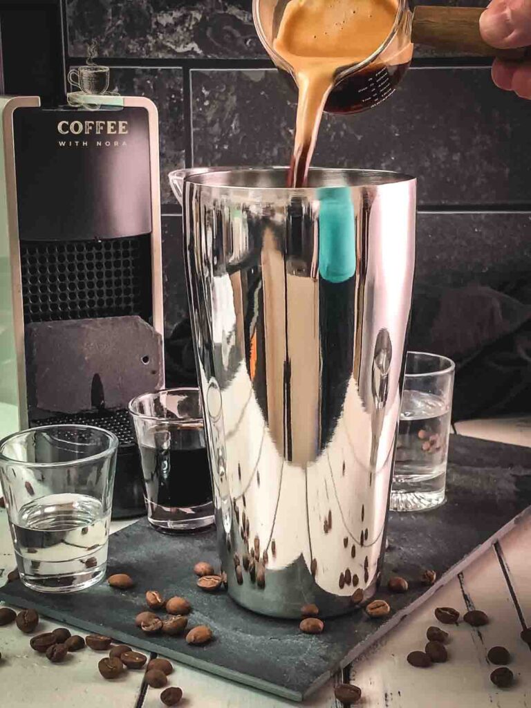 Add a Nespresso to the cocktail shaker.