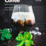 Gorgeous serving glass, filled with delicious iced irish coffee (made with homemade cold brew). Floating on top, a decadent slightly whipped cream.